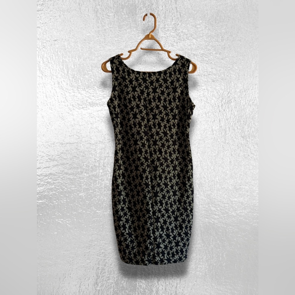 ❌ SOLD ❌ 
Vintage Avon Fashions Black and Silver Starburst Dress